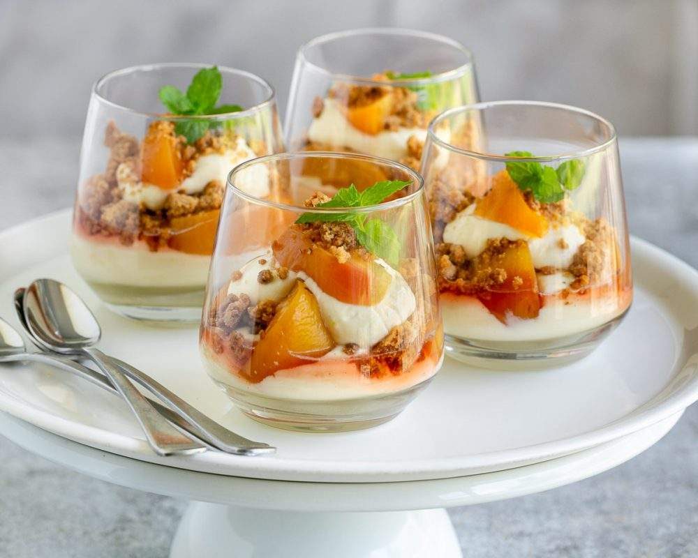 Lemon Cheesecake Mousse with Poached Peaches - Between2Kitchens